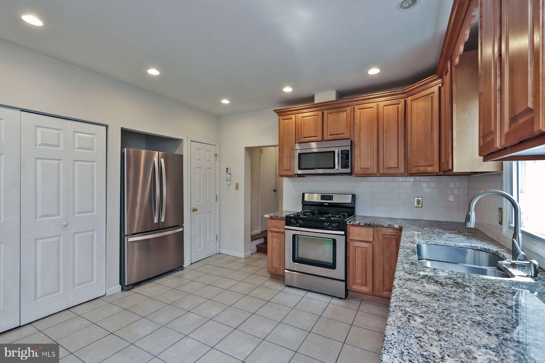 204 Lakeview Avenue Haddonfield, NJ 08033 - Photo 16 of 31 Laundry in closet in kitchen