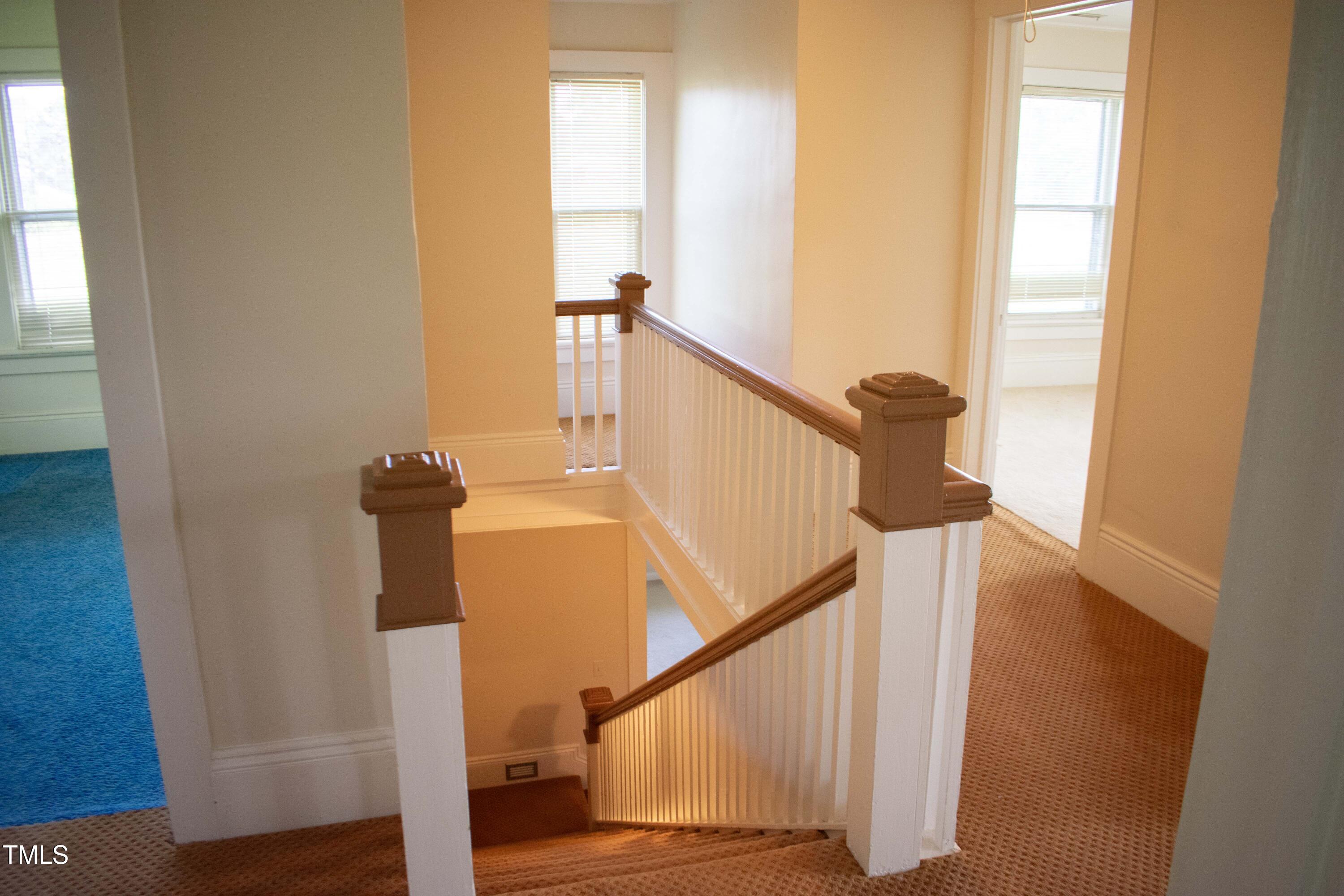 2024 Zebulon Road Zebulon, NC 27597 - Photo 12 of 16 a view of entryway and hall with wooden floor