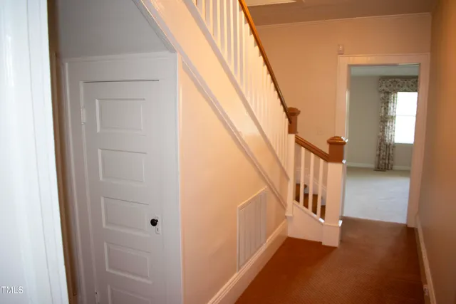 a view of an entryway with staircase