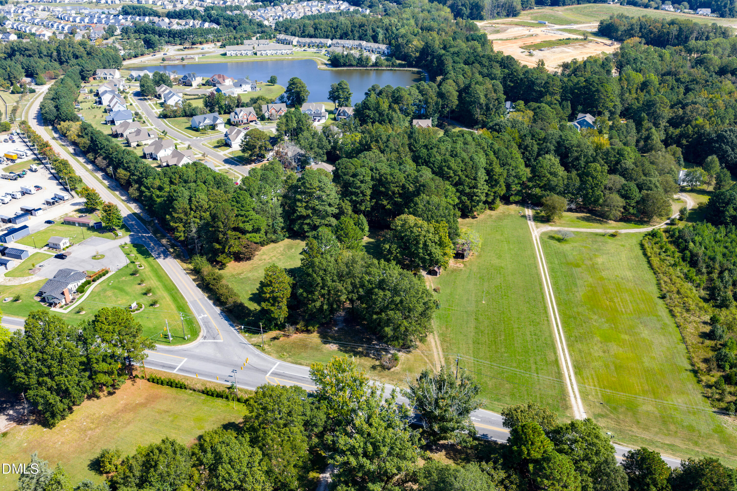 2024 Zebulon Road Zebulon, NC 27597 - Photo 6 of 16 an aerial view of a residential houses with outdoor space and trees all around
