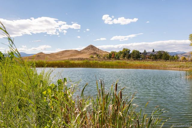 a view of lake with mountain
