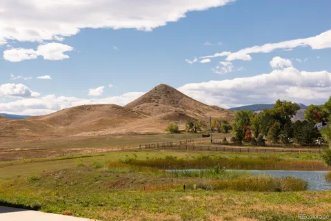 a view of an ocean and a mountain