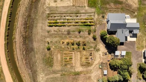 a view of a house with a yard and garage