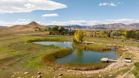 a view of an ocean and a mountain