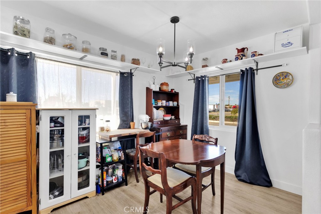 15109 Anacapa Road Victorville, CA 92392 - Photo 18 of 40 a view of a dining room with furniture and a window