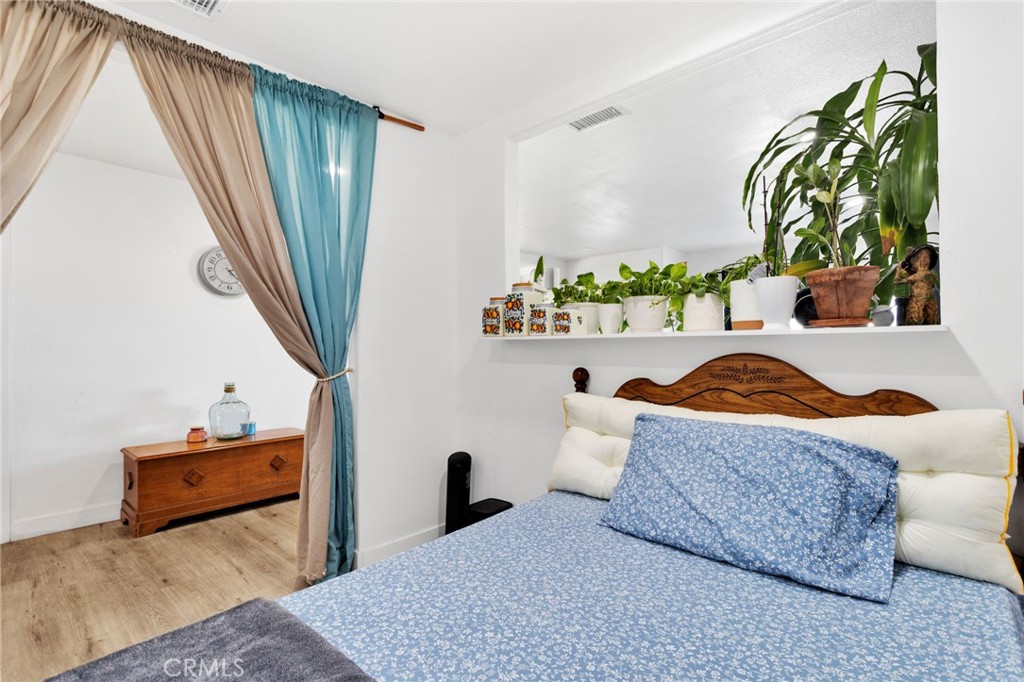 15109 Anacapa Road Victorville, CA 92392 - Photo 22 of 40 a living room with furniture rug and a large window