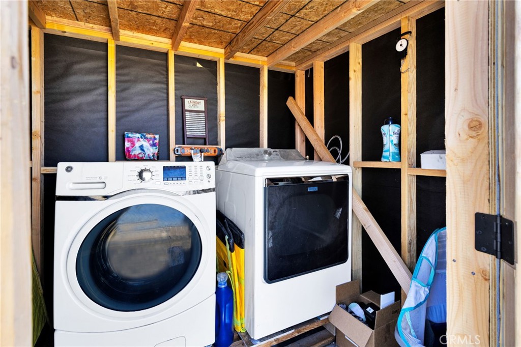 15109 Anacapa Road Victorville, CA 92392 - Photo 8 of 40 a utility room with dryer and washer