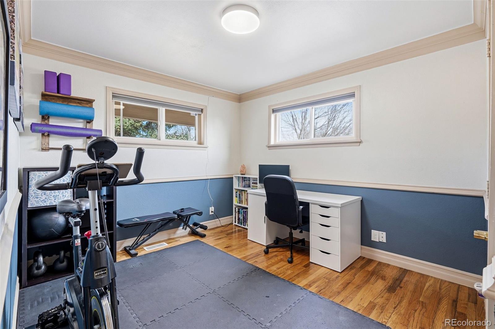 9280 Wigham Street Thornton, CO 80229 - Photo 20 of 34 a view of a workspace with furniture and a window