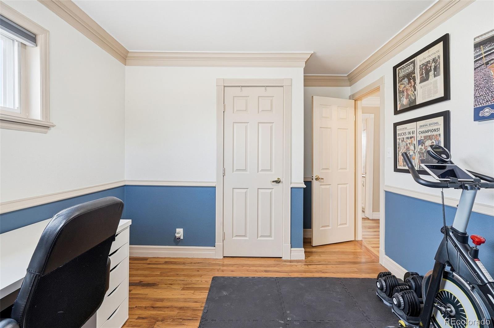 9280 Wigham Street Thornton, CO 80229 - Photo 22 of 34 a view of a livingroom with storage and utility