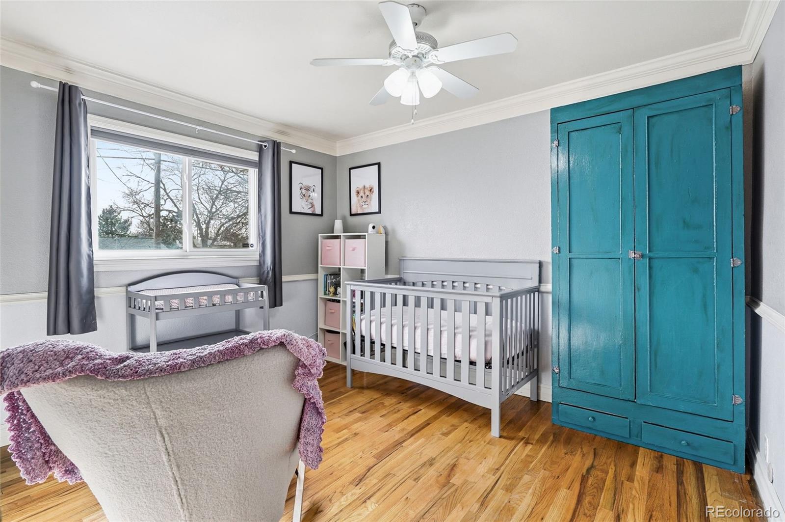 9280 Wigham Street Thornton, CO 80229 - Photo 23 of 34 a bedroom with a bed and a window