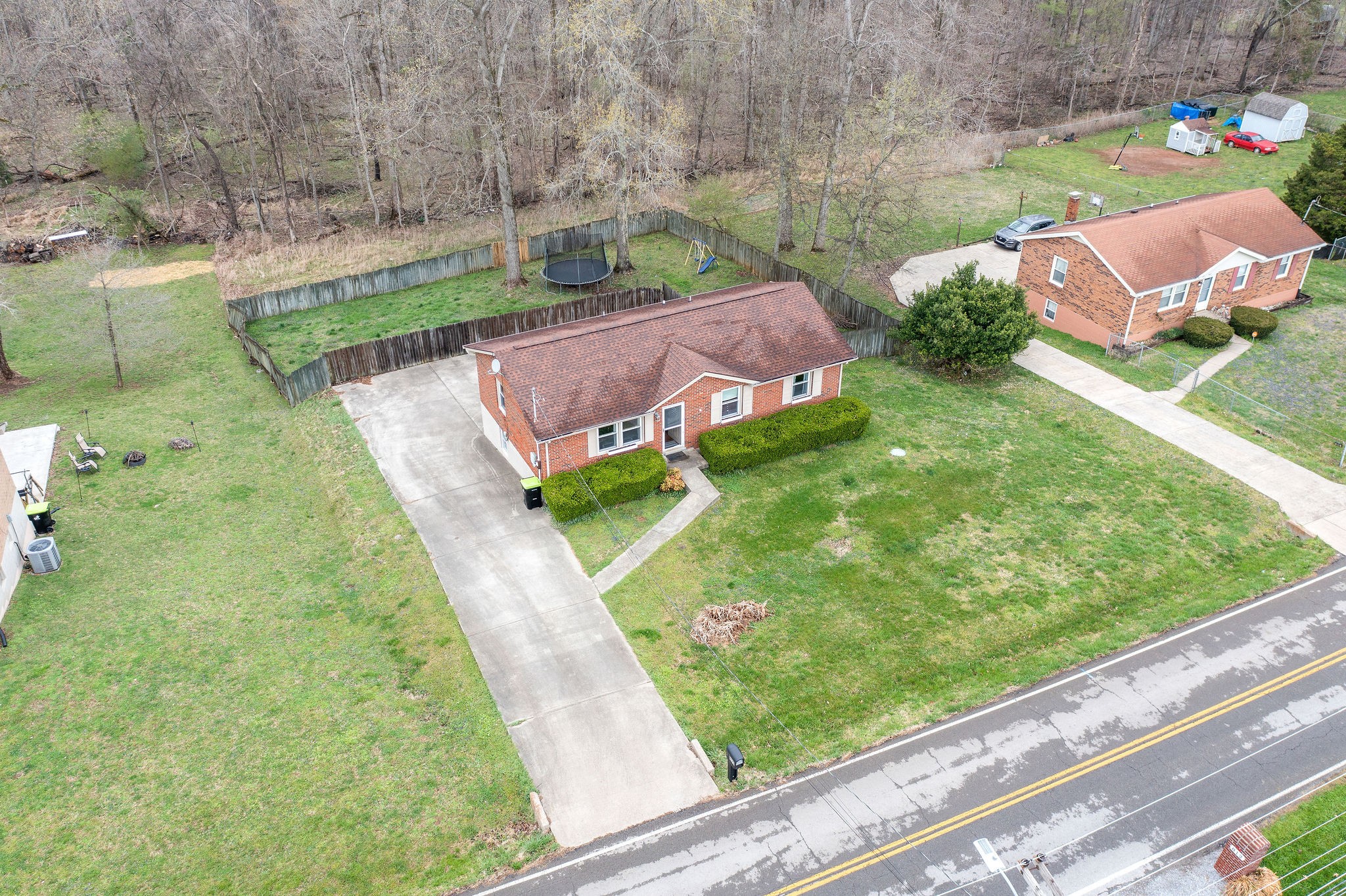 a view of a garden with a building in the background