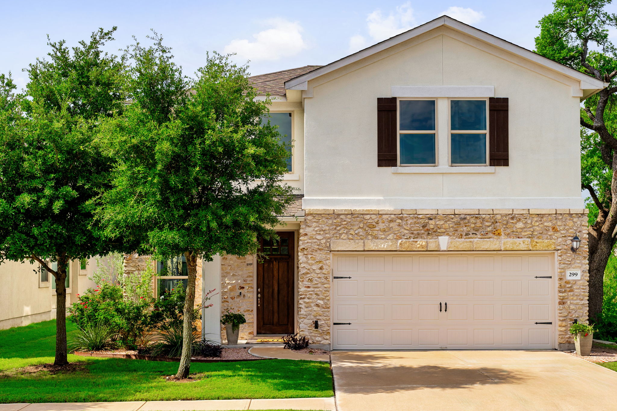 299 Diamond Point Drive Dripping Springs, TX 78620 - Photo 1 of 1 Established landscaping and automatic irrigation system.