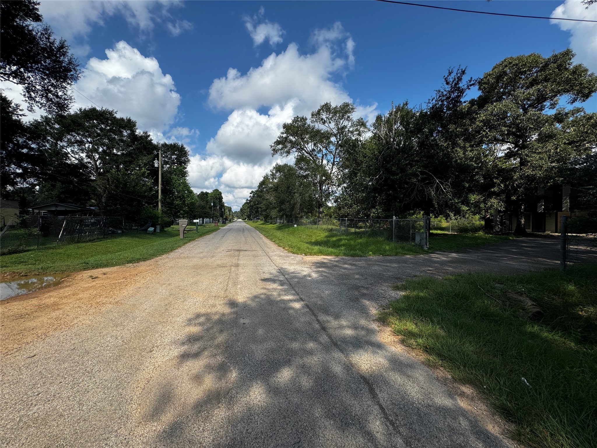 17625 Spanish Oak Conroe, TX 77306 - Photo 6 of 14 a view of outdoor space with green field and trees