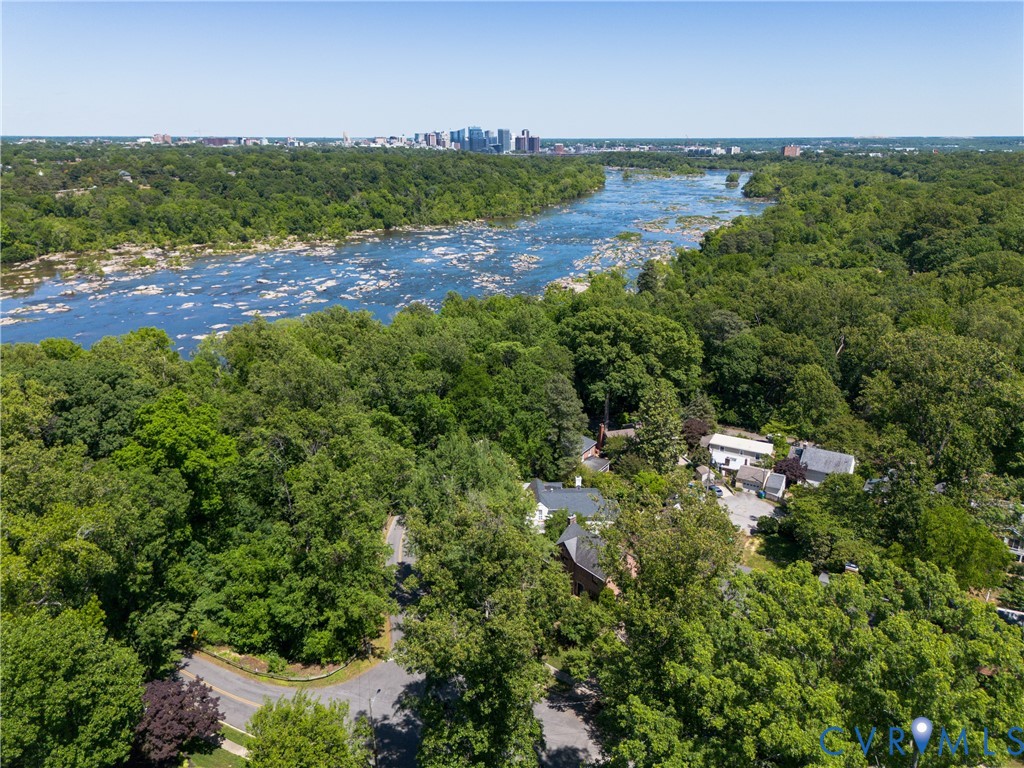 4814 Riverside Drive Richmond, VA 23225 - Photo 5 of 39 a view of a lake with houses in the back
