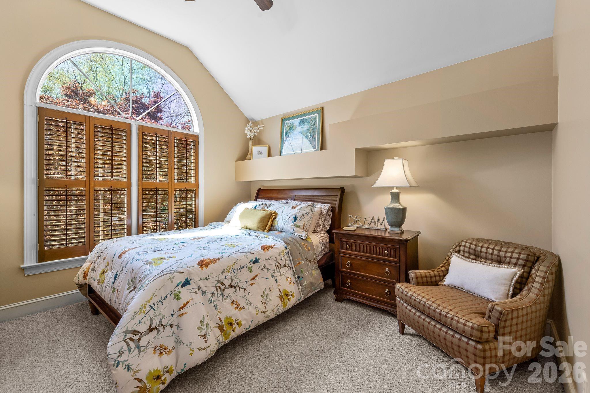 3530 Cardiff Lane Matthews, NC 28104 - Photo 29 of 39 a bedroom with bed and a large window