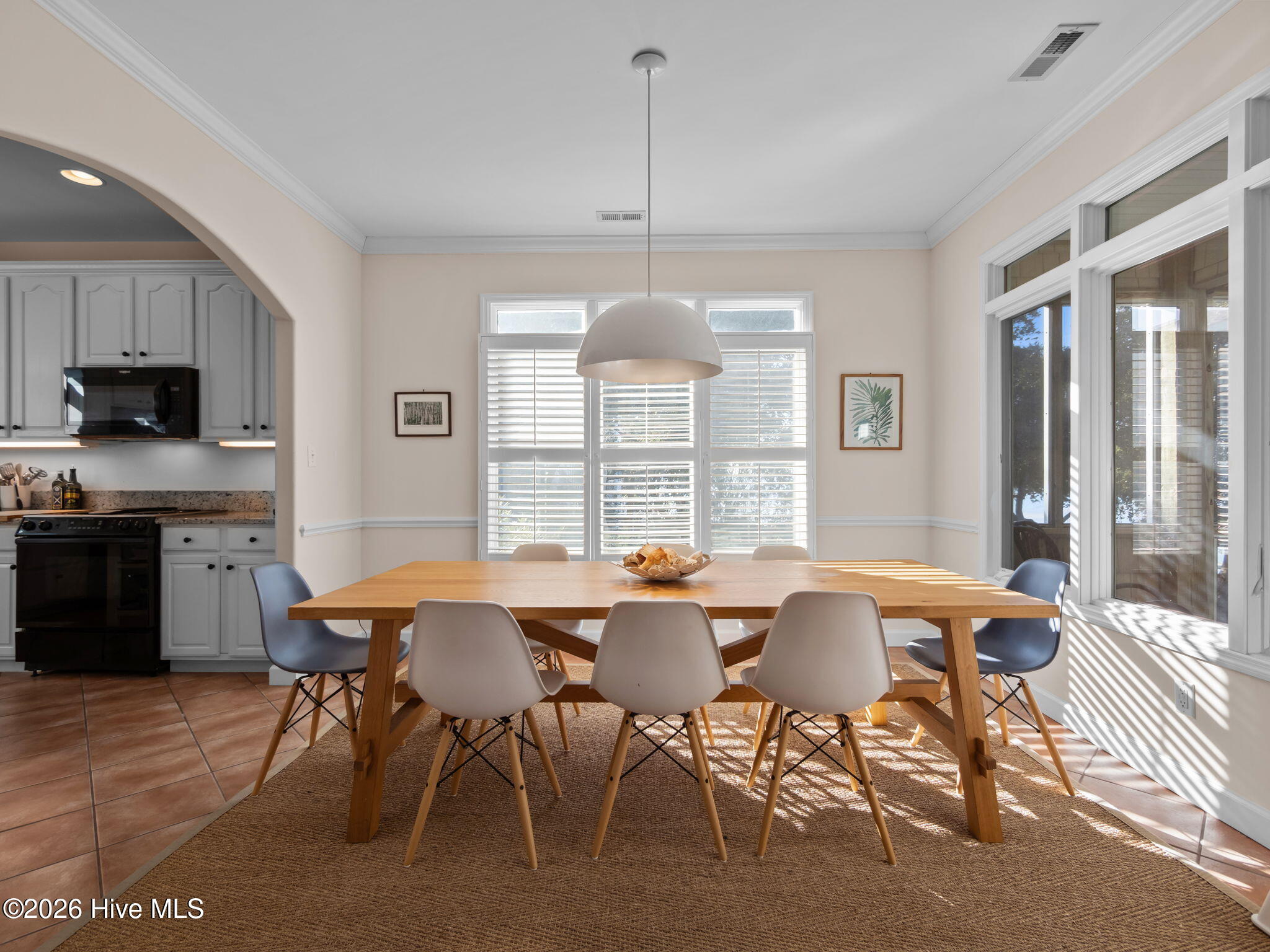 1206 Timber Trail Emerald Isle, NC 28594 - Photo 12 of 48 Dining area opens to kitchen & living room