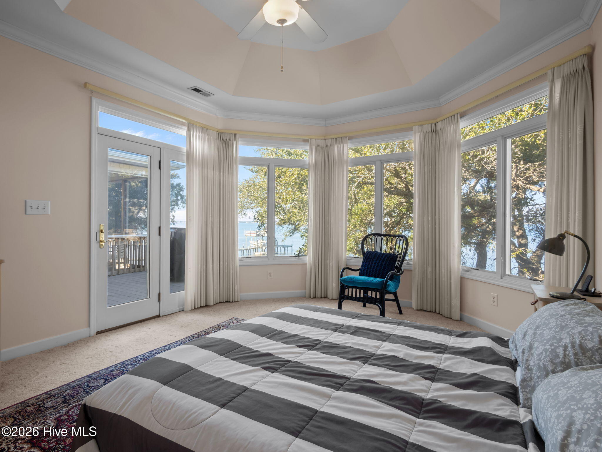 1206 Timber Trail Emerald Isle, NC 28594 - Photo 22 of 48 Master bedroom with custom trim