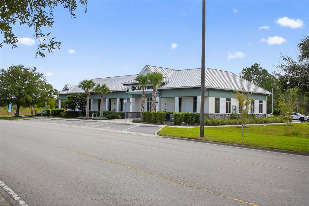 469 Bulldog Drive, Unit 3 Palm Coast, FL 32164 - Photo 18 of 54 a front view of house with yard and green space
