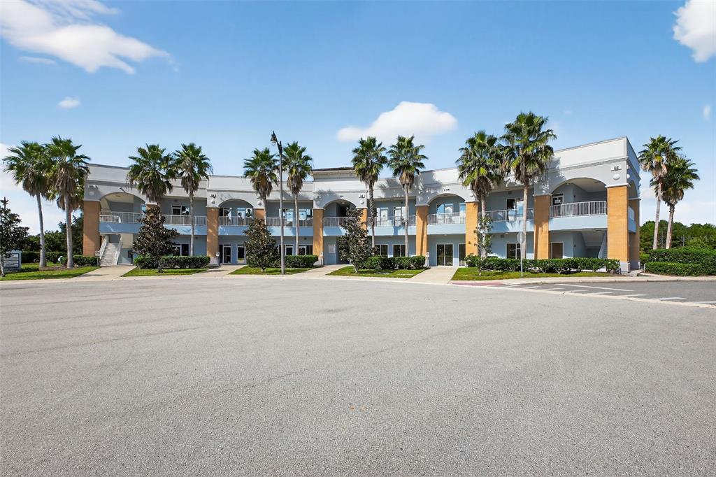 469 Bulldog Drive, Unit 3 Palm Coast, FL 32164 - Photo 20 of 54 front view of a house with a street
