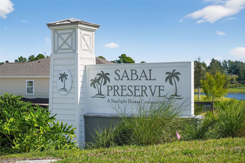 469 Bulldog Drive, Unit 3 Palm Coast, FL 32164 - Photo 25 of 54 a sign on the side of a building