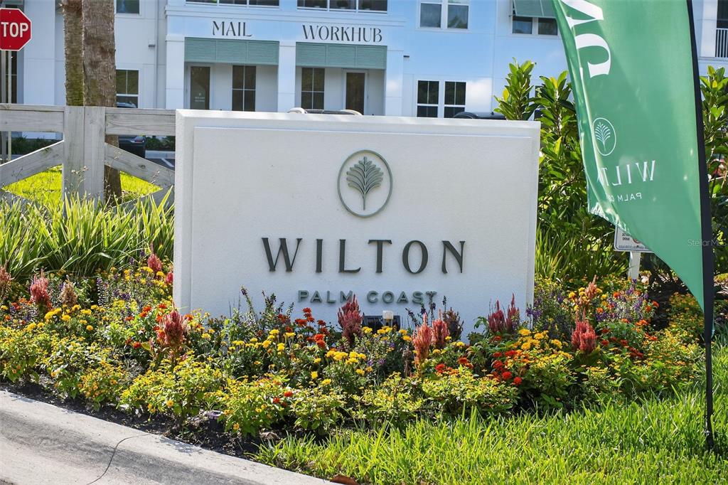 469 Bulldog Drive, Unit 3 Palm Coast, FL 32164 - Photo 31 of 54 a sign that is on the side of a building