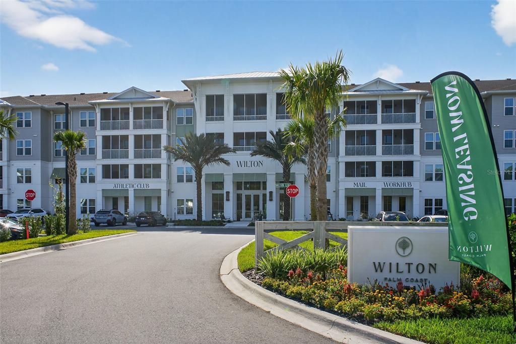 469 Bulldog Drive, Unit 3 Palm Coast, FL 32164 - Photo 34 of 54 a front view of a building with street view