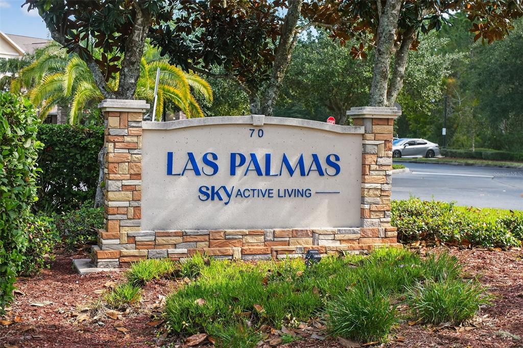 469 Bulldog Drive, Unit 3 Palm Coast, FL 32164 - Photo 36 of 54 a sign that is on a brick wall