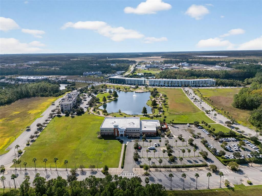 469 Bulldog Drive, Unit 3 Palm Coast, FL 32164 - Photo 52 of 54 an aerial view of a house with a lake view