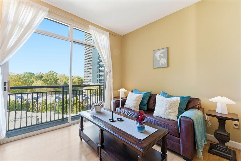 a living room with furniture and a window
