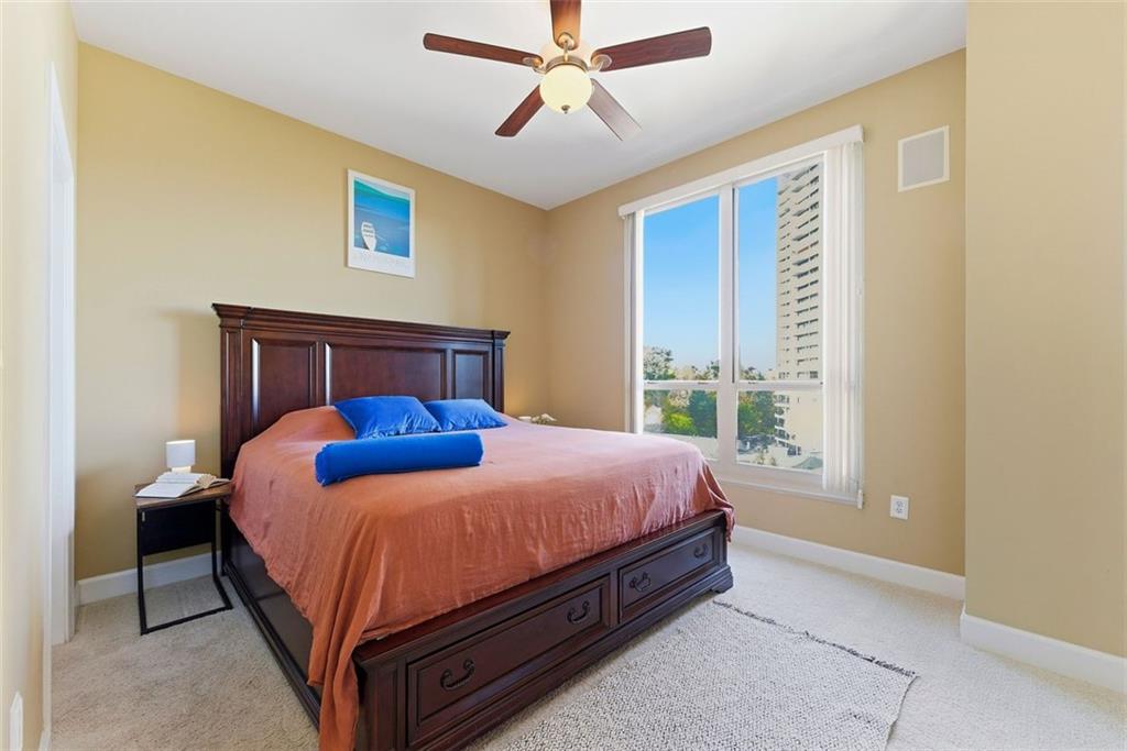 2626 Peachtree Road Northwest, Unit 1006 Atlanta, GA 30305 - Photo 11 of 19 a bedroom with a bed and window