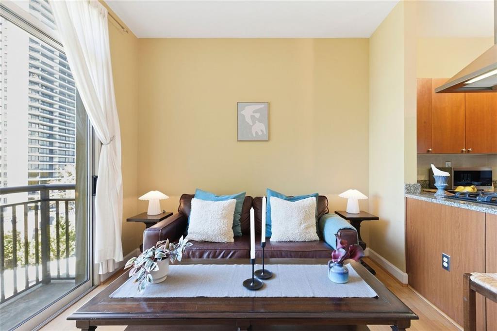 2626 Peachtree Road Northwest, Unit 1006 Atlanta, GA 30305 - Photo 3 of 19 a living room with furniture