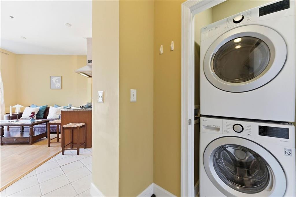 2626 Peachtree Road Northwest, Unit 1006 Atlanta, GA 30305 - Photo 4 of 19 a view of a hallway with washer and dryer