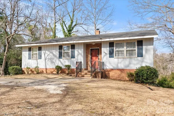a front view of a house with patio