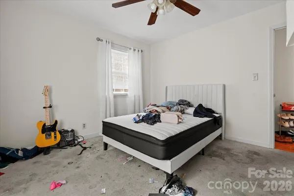 a view of a workspace with furniture