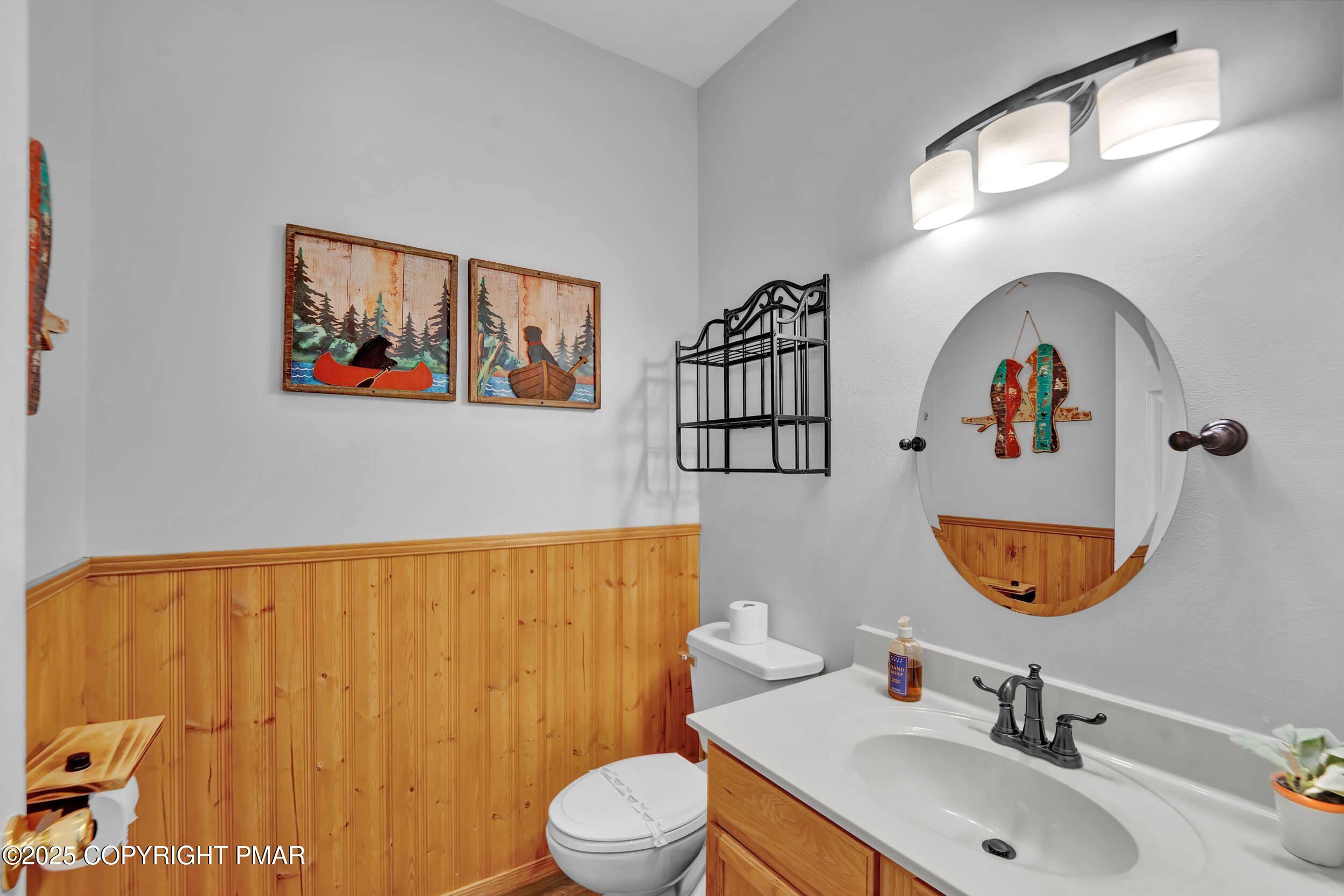 112 Maccauley Road Albrightsville, PA 18210 - Photo 22 of 76 a bathroom with a sink mirror vanity and toilet