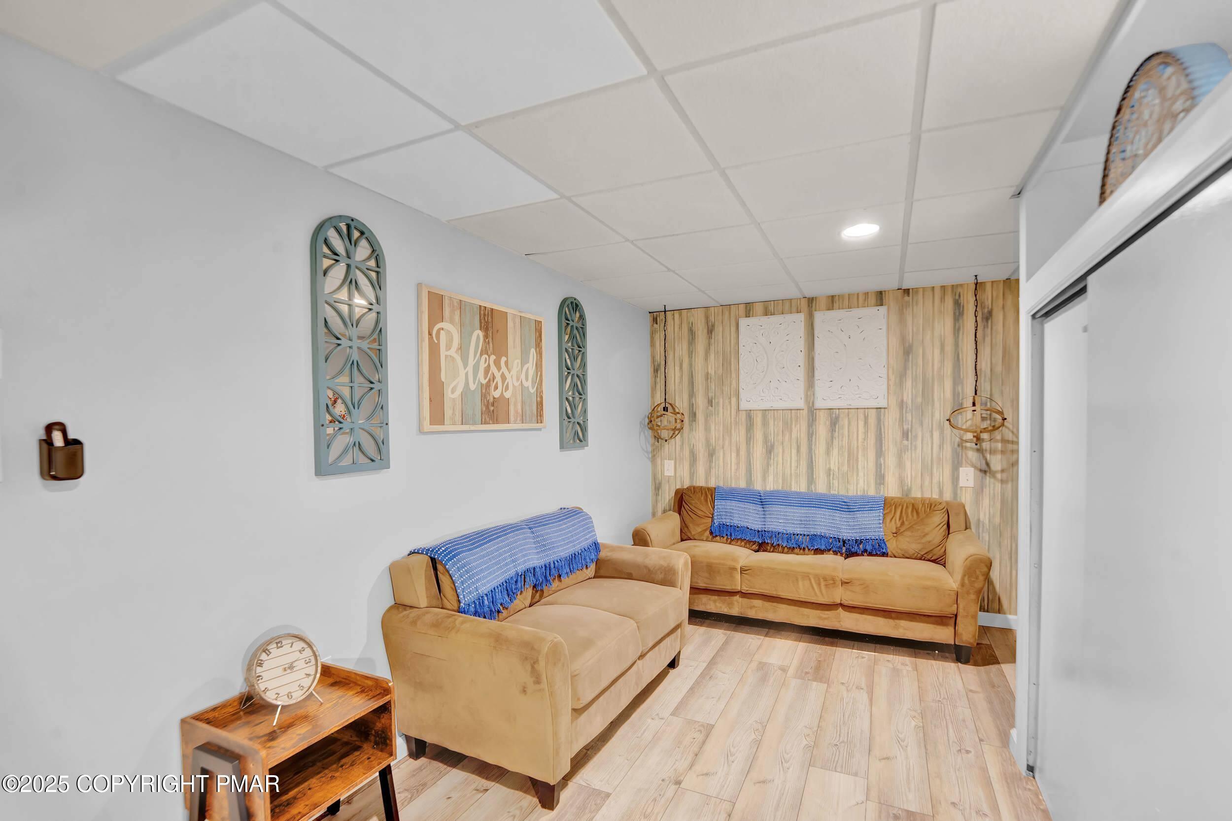 112 Maccauley Road Albrightsville, PA 18210 - Photo 32 of 76 a bedroom with furniture and a couch