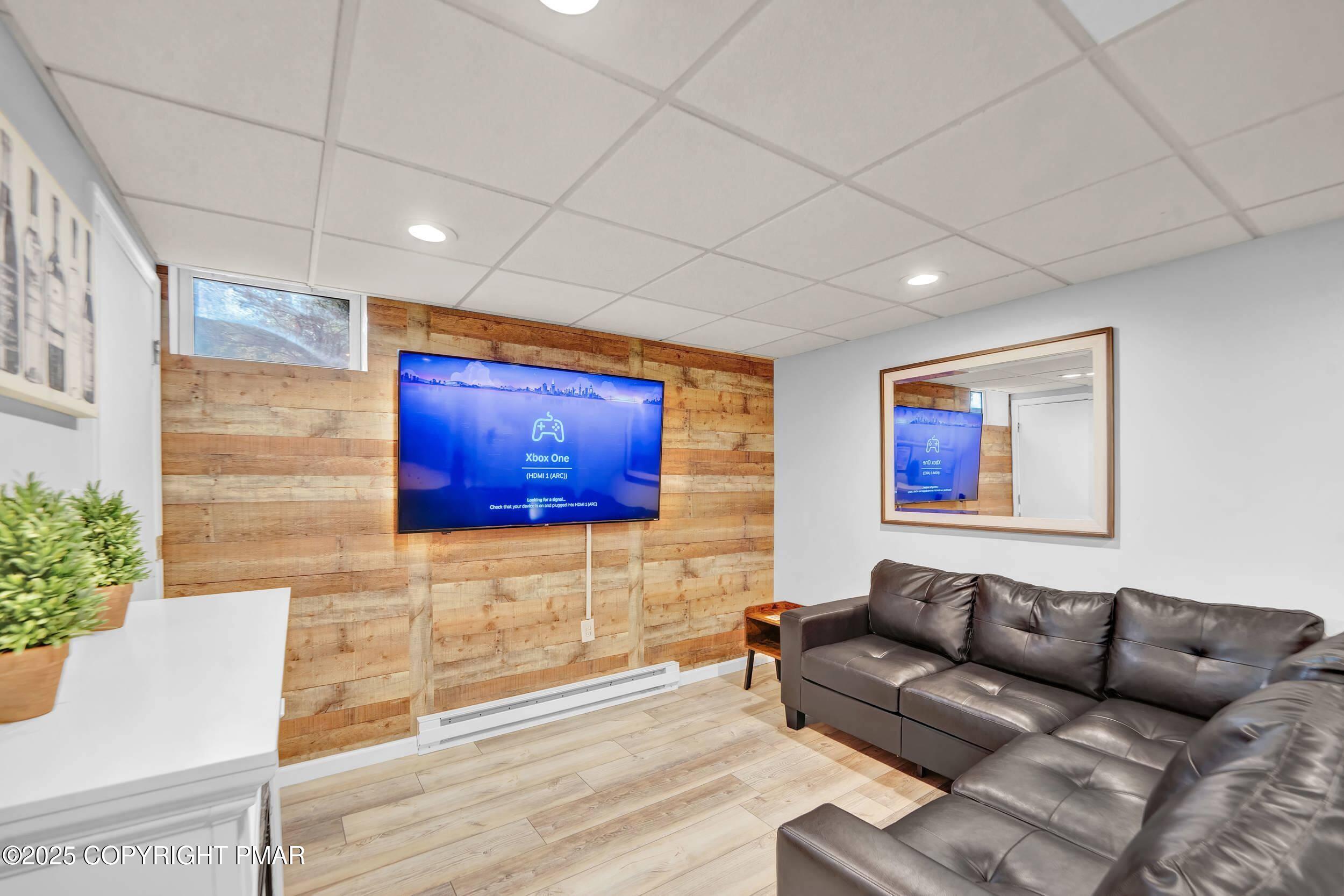 112 Maccauley Road Albrightsville, PA 18210 - Photo 4 of 76 a living room with furniture and a potted plant