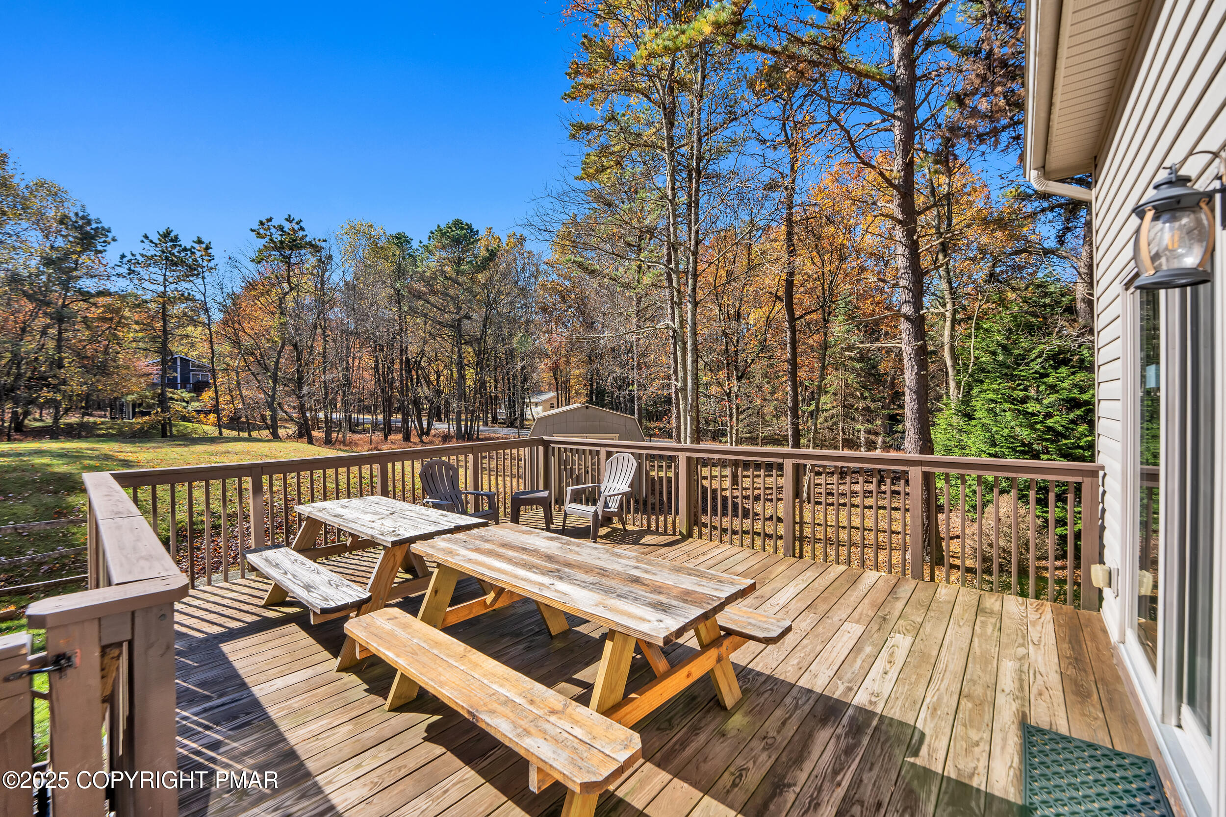 112 Maccauley Road Albrightsville, PA 18210 - Photo 52 of 76 a view of a balcony with wooden floor and outdoor seating