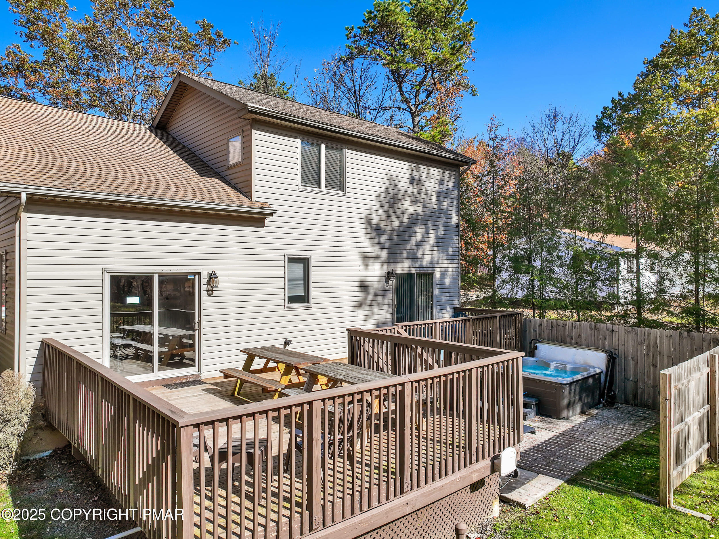 112 Maccauley Road Albrightsville, PA 18210 - Photo 60 of 76 a view of a roof deck with couches chairs and wooden fence