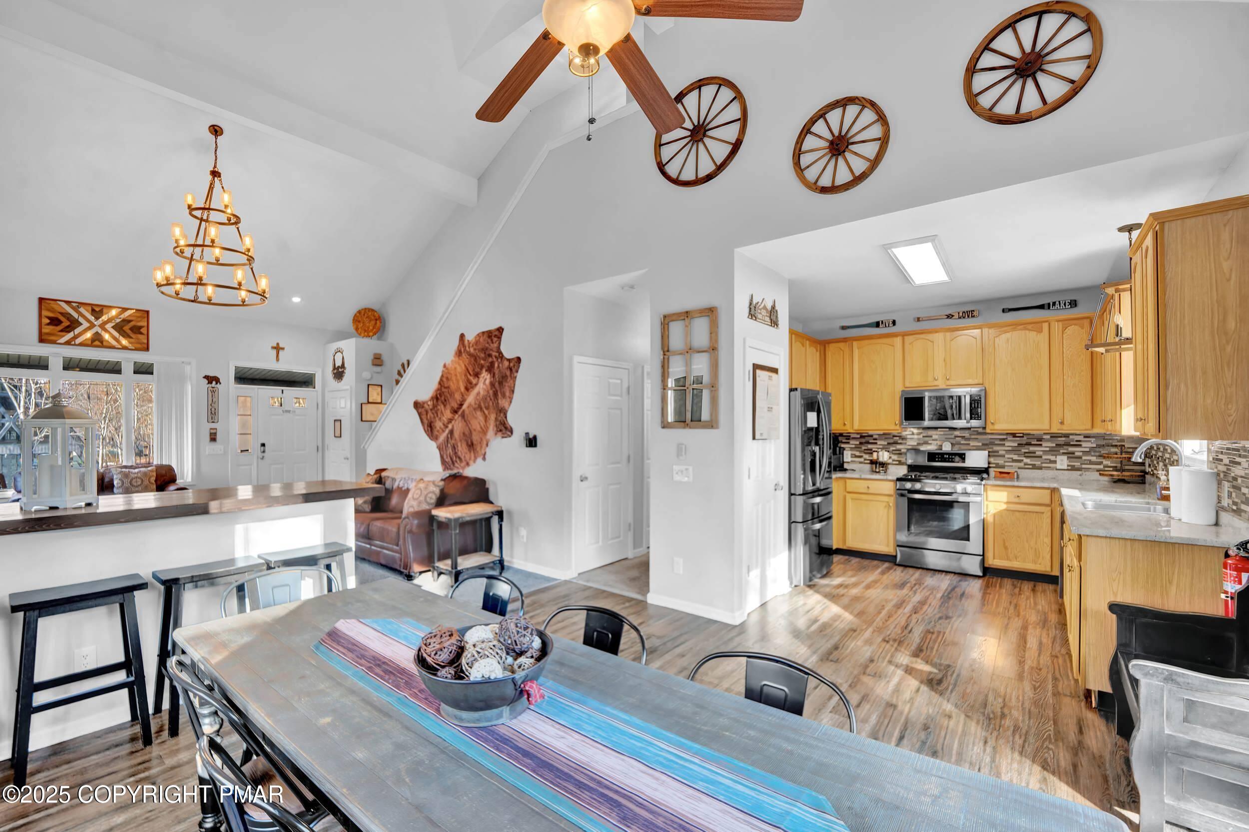 112 Maccauley Road Albrightsville, PA 18210 - Photo 10 of 76 a living room with furniture kitchen view and a table