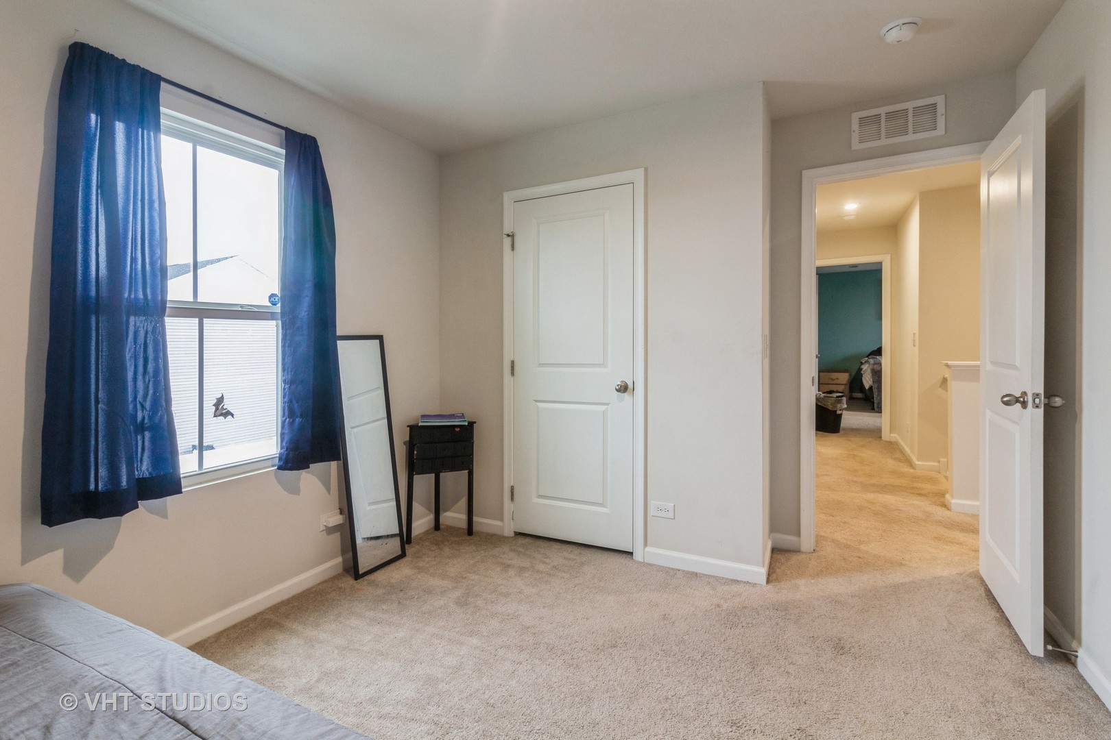313 Pheasant Run Road Joliet, IL 60433 - Photo 14 of 24 an empty room with windows and closet