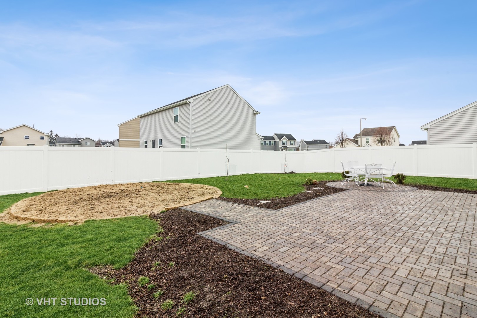 313 Pheasant Run Road Joliet, IL 60433 - Photo 20 of 24 a view of a house with a yard and ocean view