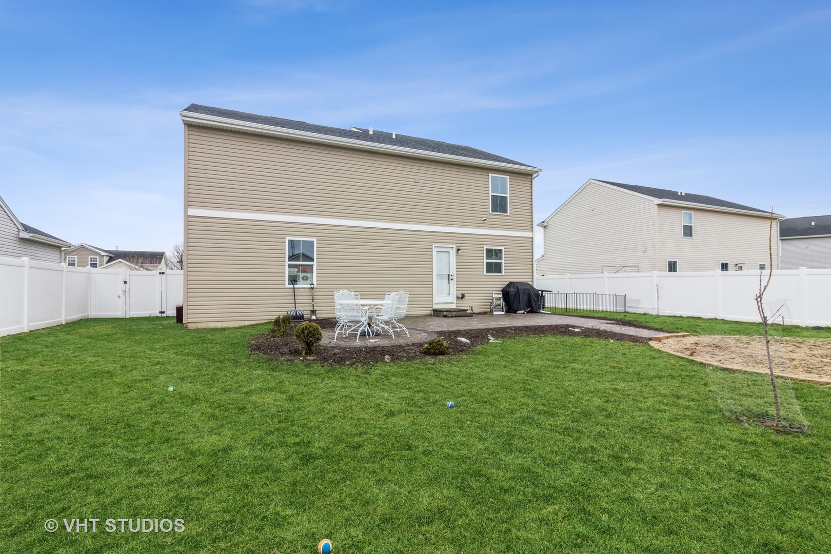 313 Pheasant Run Road Joliet, IL 60433 - Photo 21 of 24 a view of a backyard with sitting area