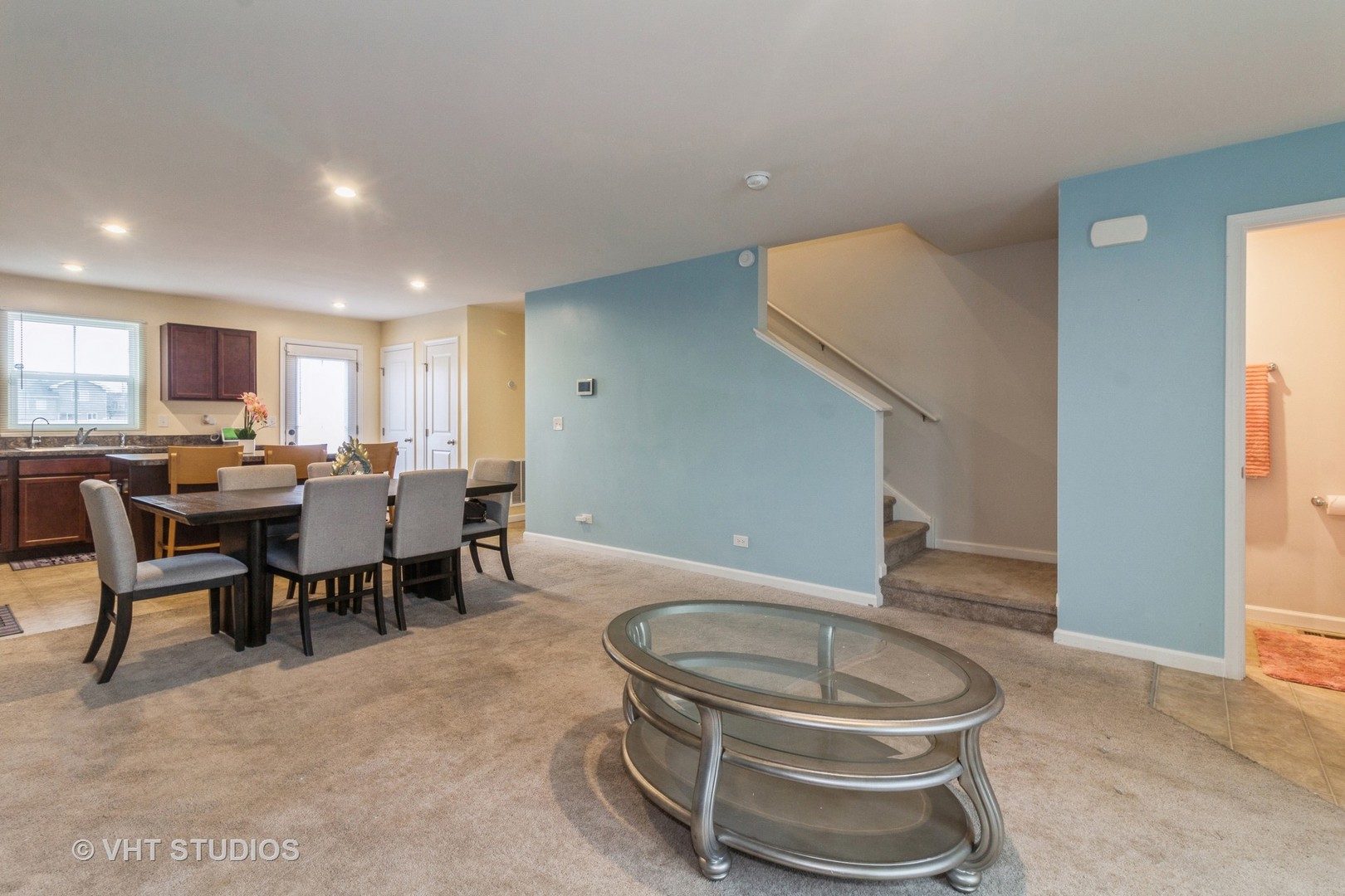 313 Pheasant Run Road Joliet, IL 60433 - Photo 3 of 24 a room with a dining table and chairs