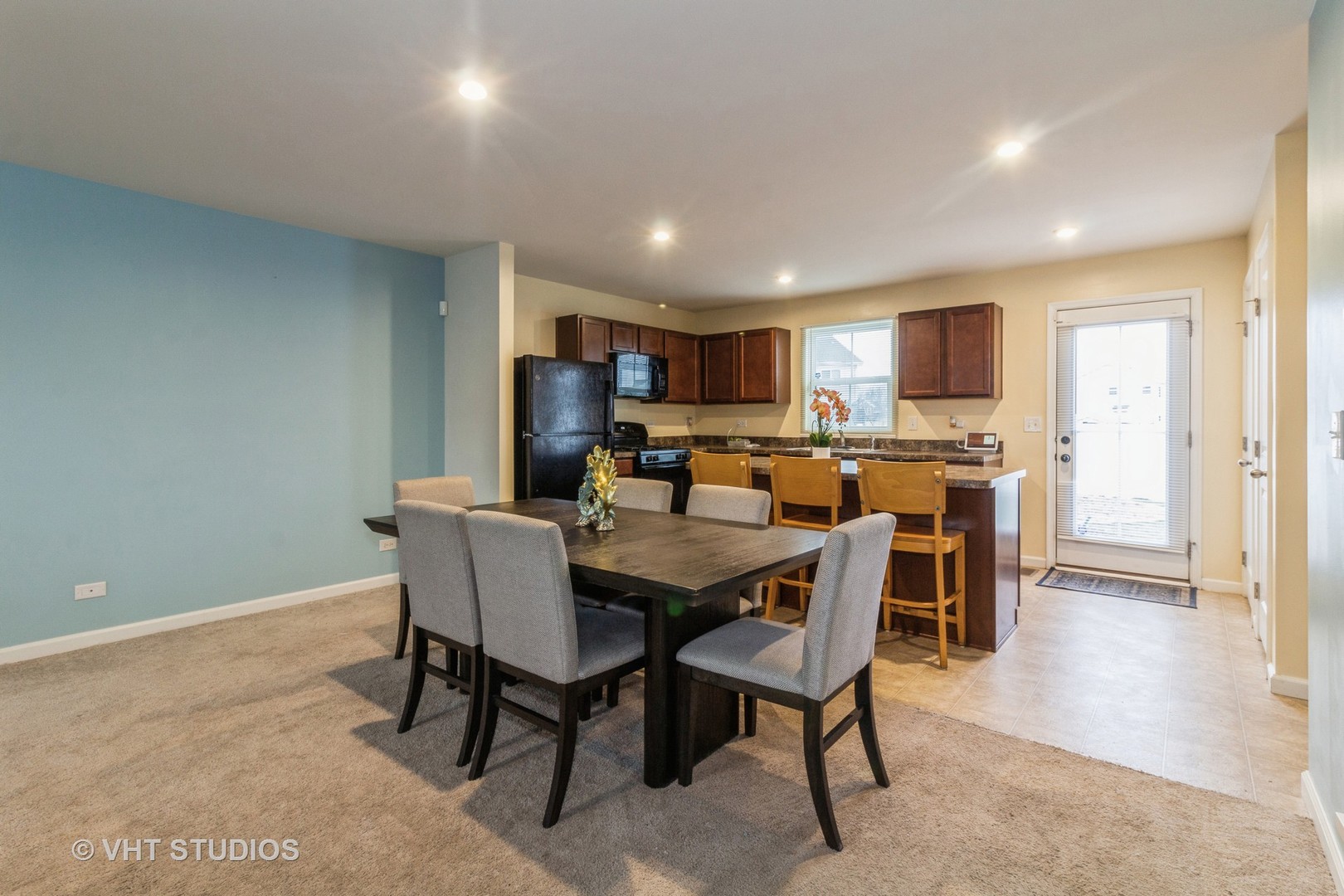 313 Pheasant Run Road Joliet, IL 60433 - Photo 5 of 24 a view of a dining room with furniture