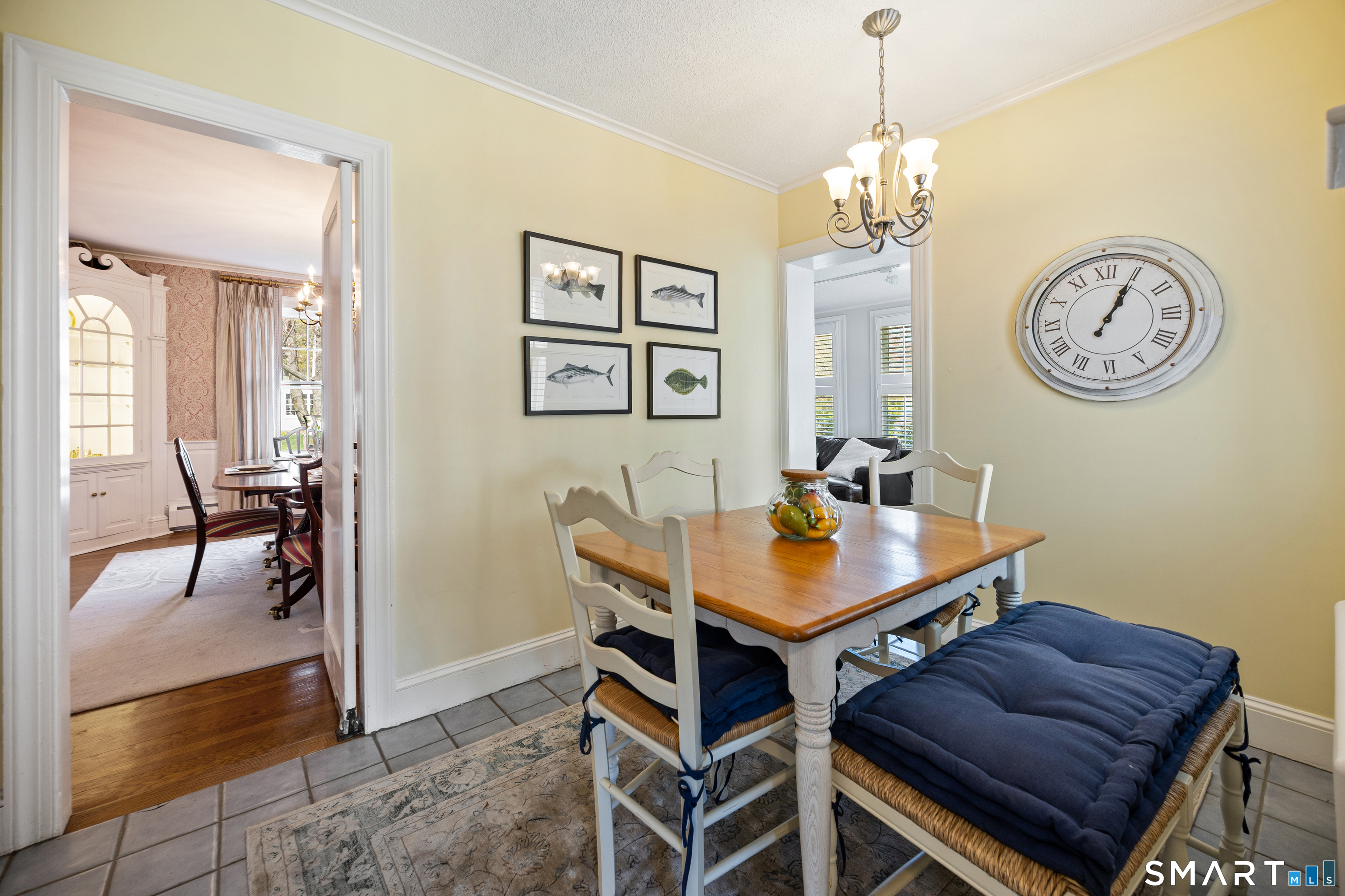 40 10 Acre Road New Britain, CT 06052 - Photo 9 of 38 a view of a dining room with furniture and a chandelier