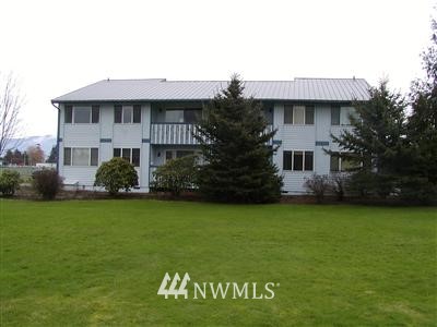 316 Front Street Sumas, WA 98295 - Photo 1 of 1 a front view of a house with garden
