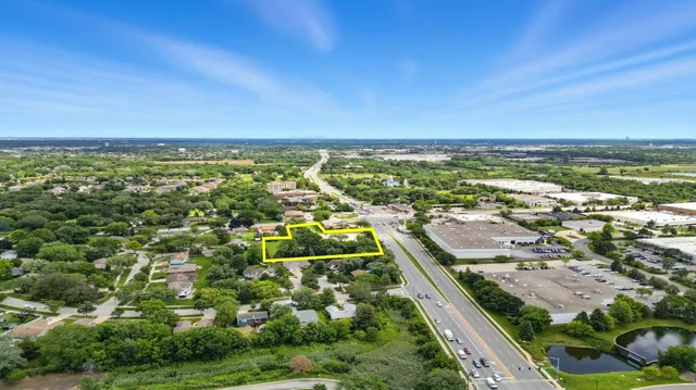 a view of a backyard with a garden