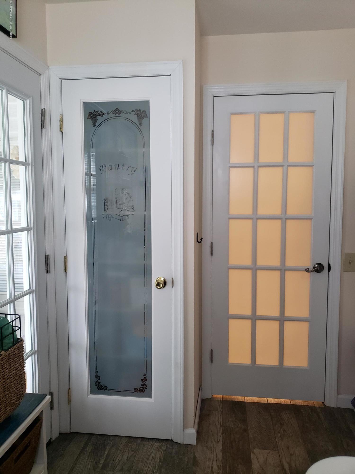 33 Mill Road, Unit 64 Whiting, NJ 08759 - Photo 9 of 23 an empty room with windows and closet