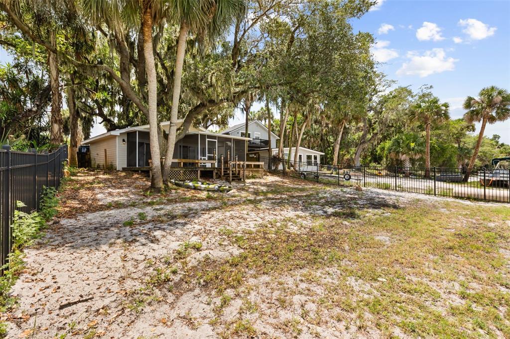2462 Fort Lane Road Geneva, FL 32732 - Photo 24 of 31 a front view of a house with a yard